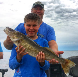 Young man with a walleye