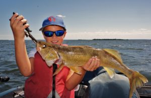 One happy young fisherman with a great walleye!