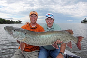 Co-owner and guide Jeff Anderson holds a monster muskie from Mille Lacs.