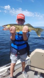 Young man with a nice walleye